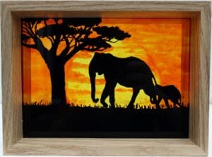 Painted Elephants at Sunset on Glass