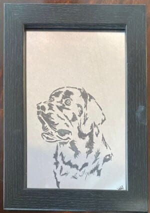 Etched dog on mirror